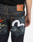 Jeans Evisu denim scuro con pesce