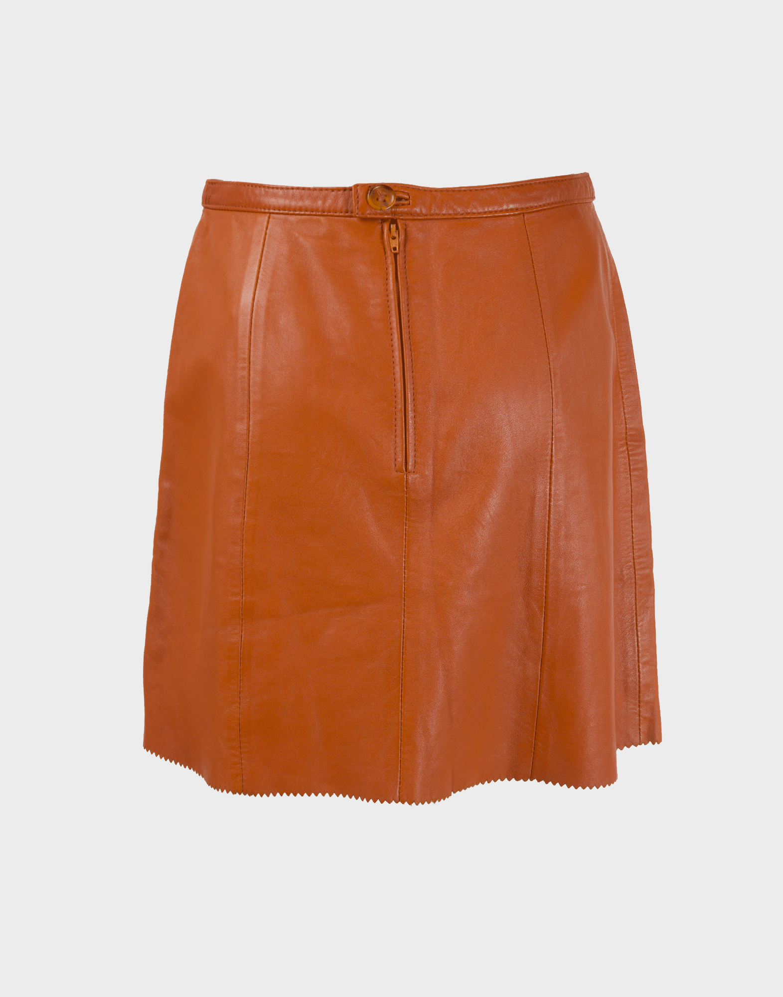 Flared orange leather skirt with back zip and button closure. Photographed on a ghost mannequin against a gray background.
