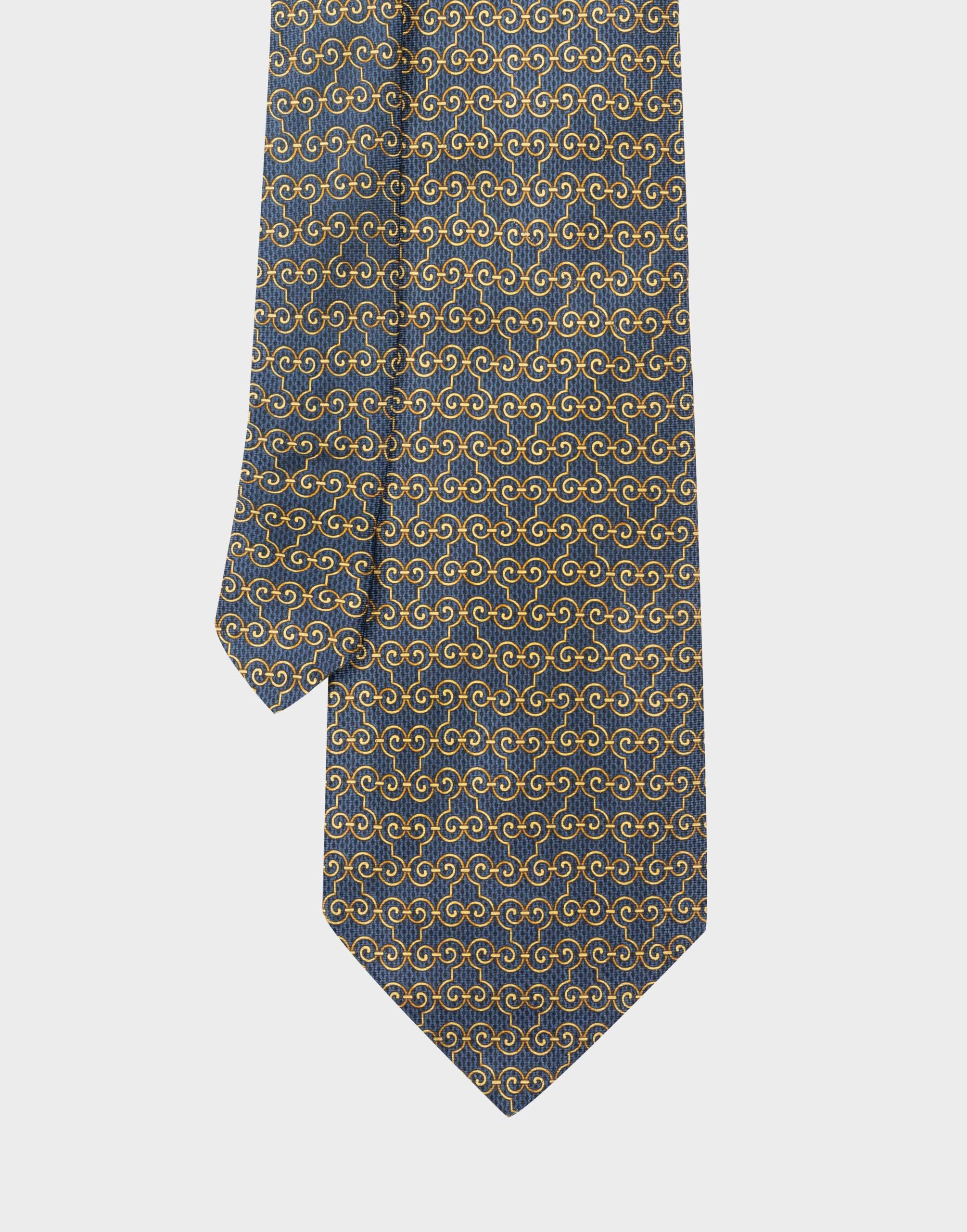 blue silk tie with gold geometric pattern