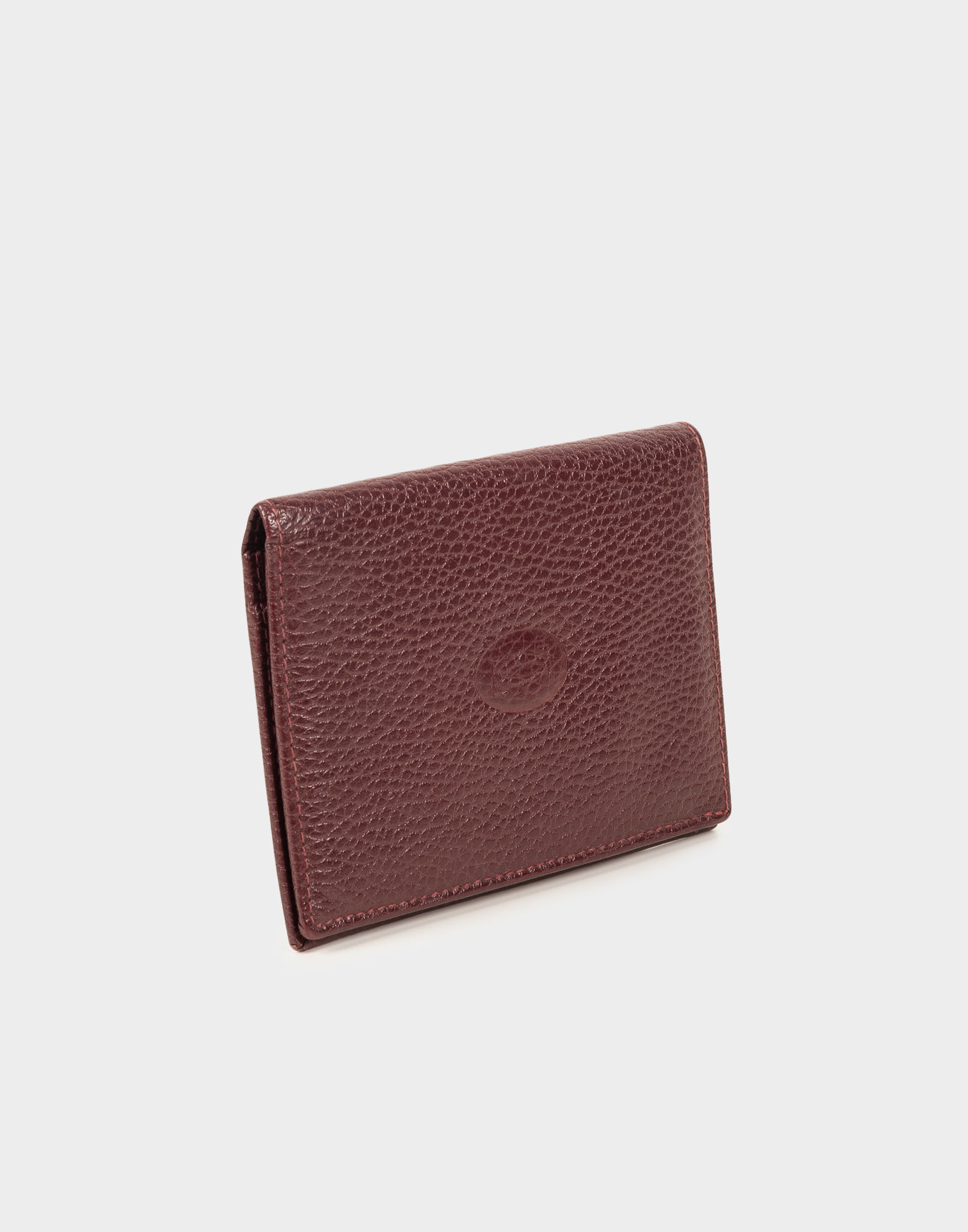 cartier card case in burgundy-coloured grained leather with embossed logo