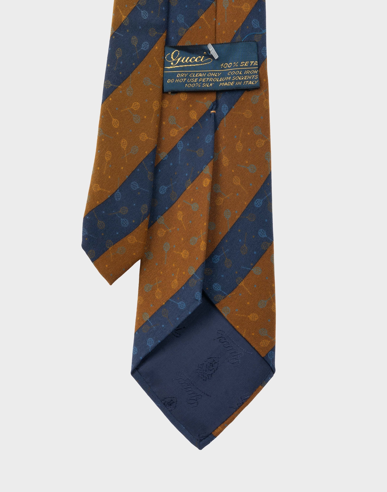 men's silk tie with brown and blue diagonal stripe pattern, tennis rackets