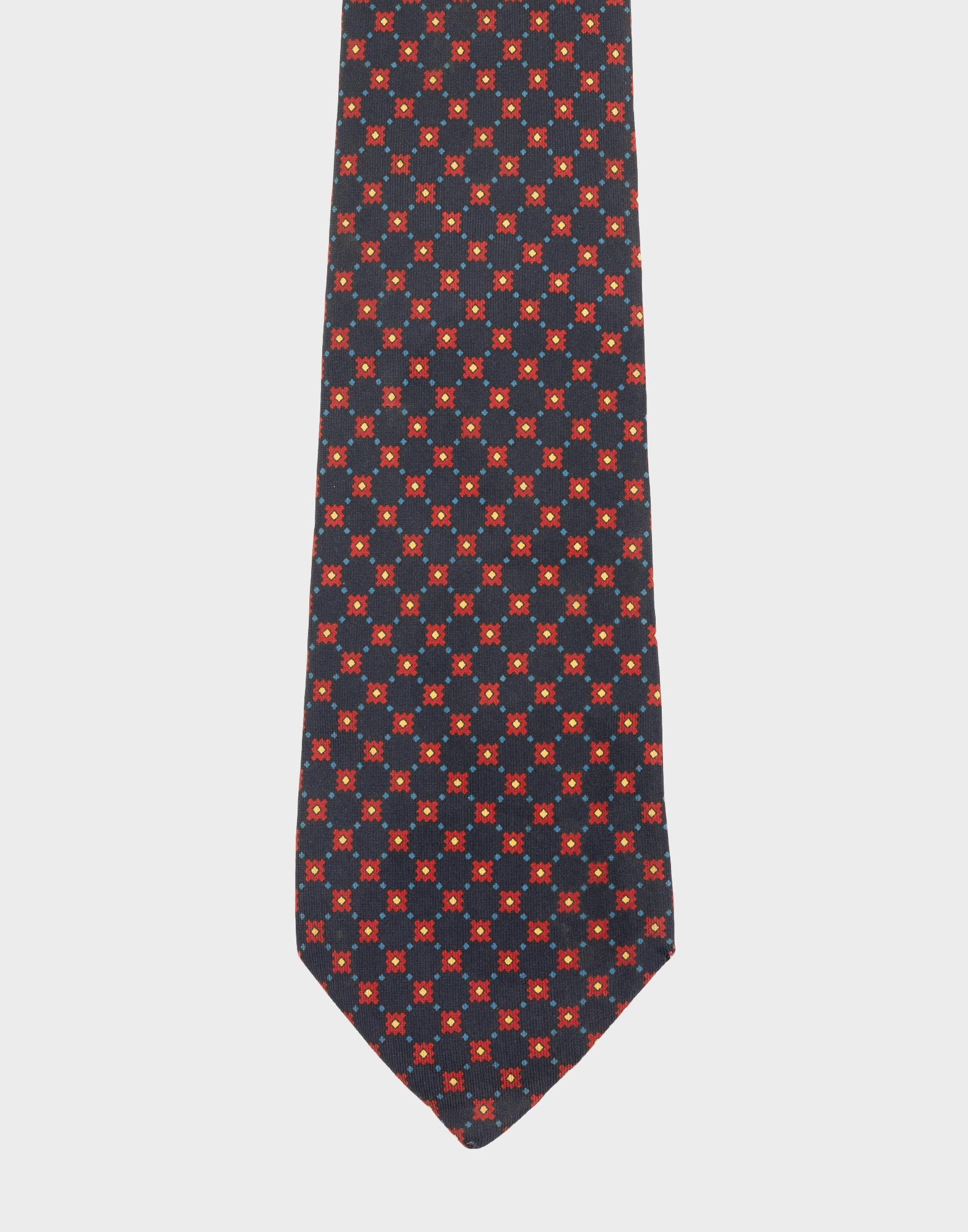 Men's blue silk tie by E. Marinella with a geometric floral pattern.