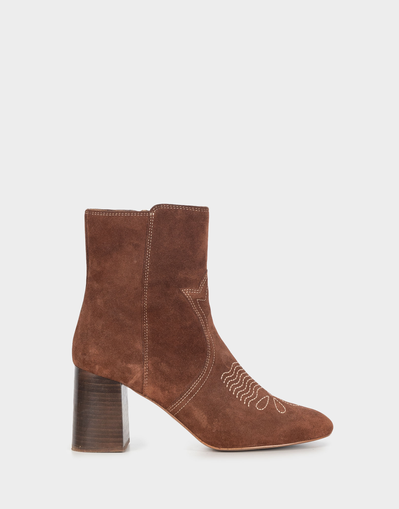 Brown suede women's ankle boots by Chloe with ivory contrast stitching and designs, featuring a chunky wooden heel.