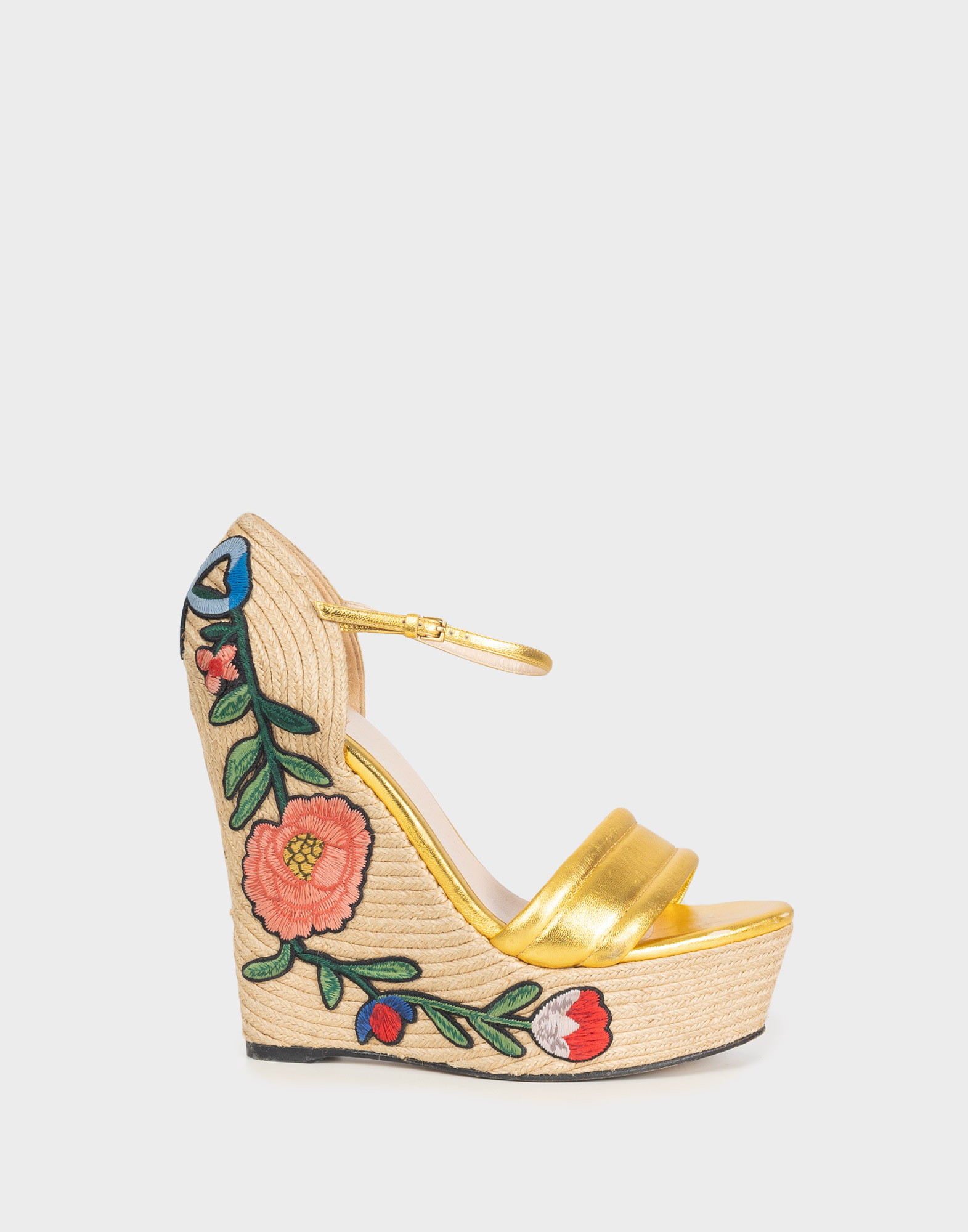 Women's raffia wedge sandal with embroidered floral appliqués, gold-colored leather details and ankle strap