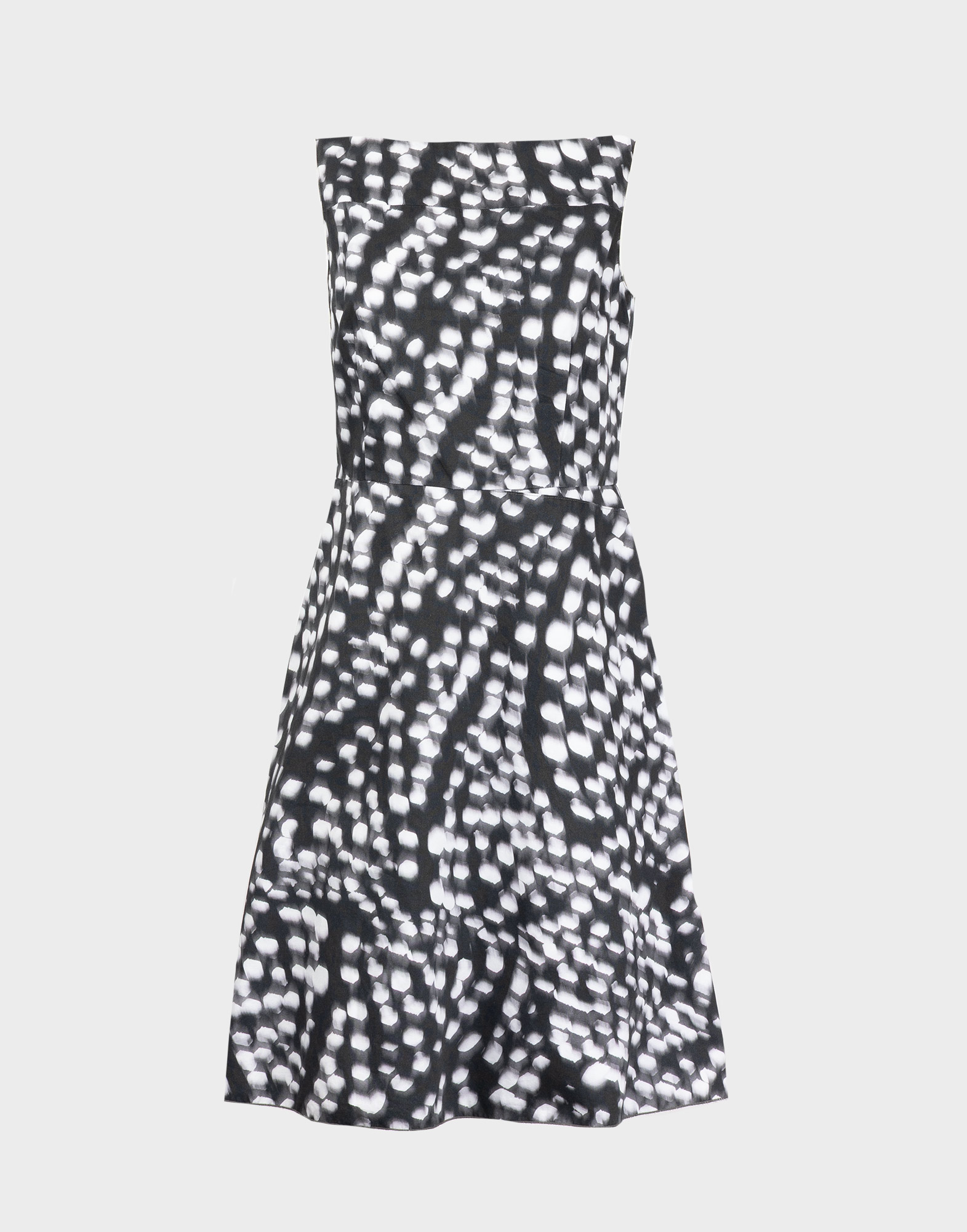mid-length women's sleeveless dress with circle patterned grey skirt