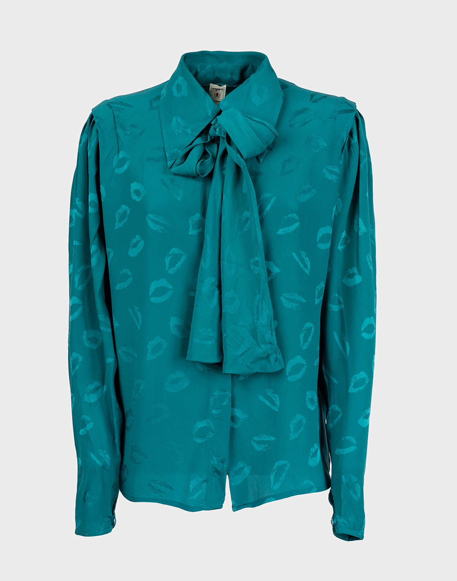 Women's silk shirt in green color, bow on the neck