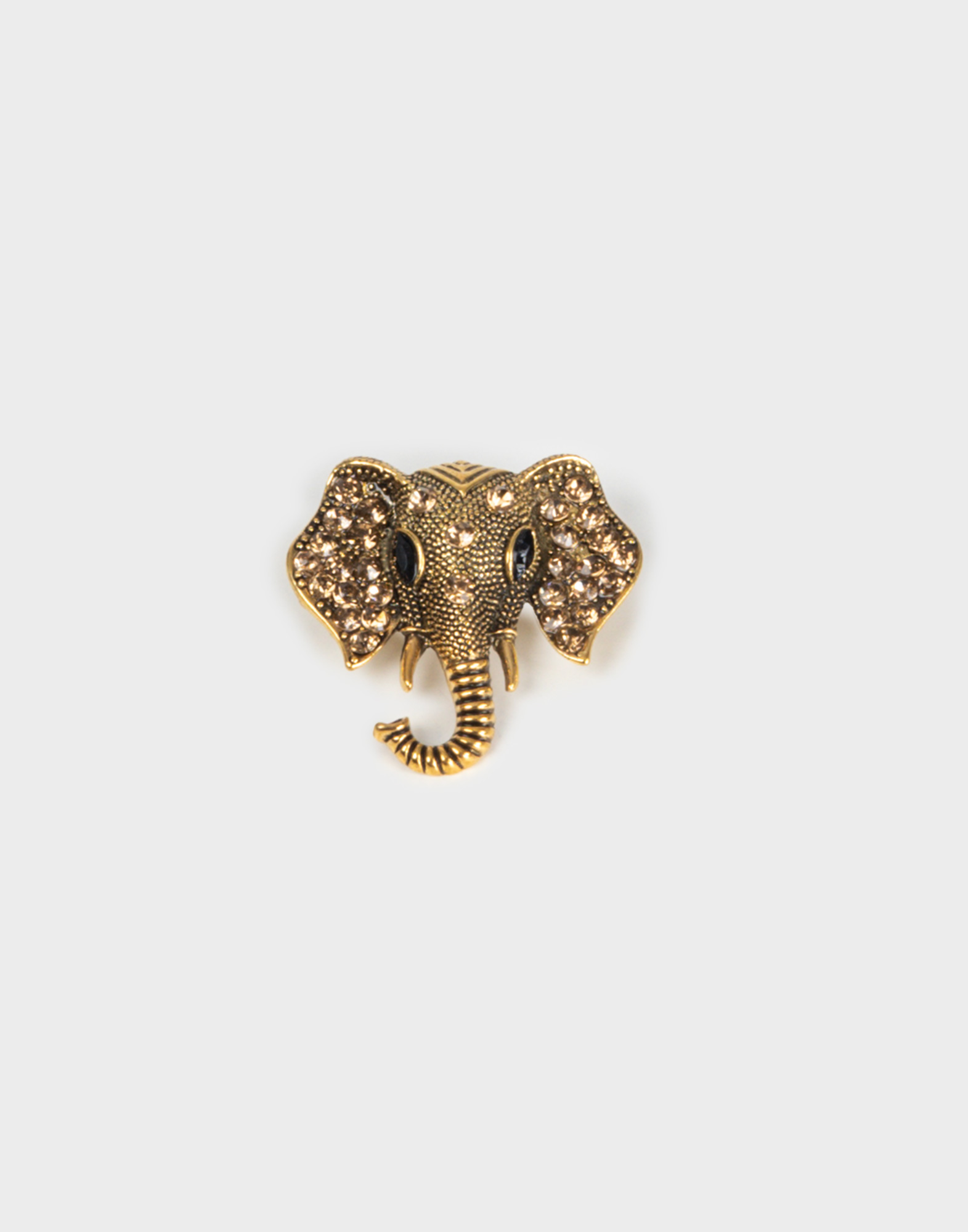 spilla dorata con strass a forma di testa di elefante